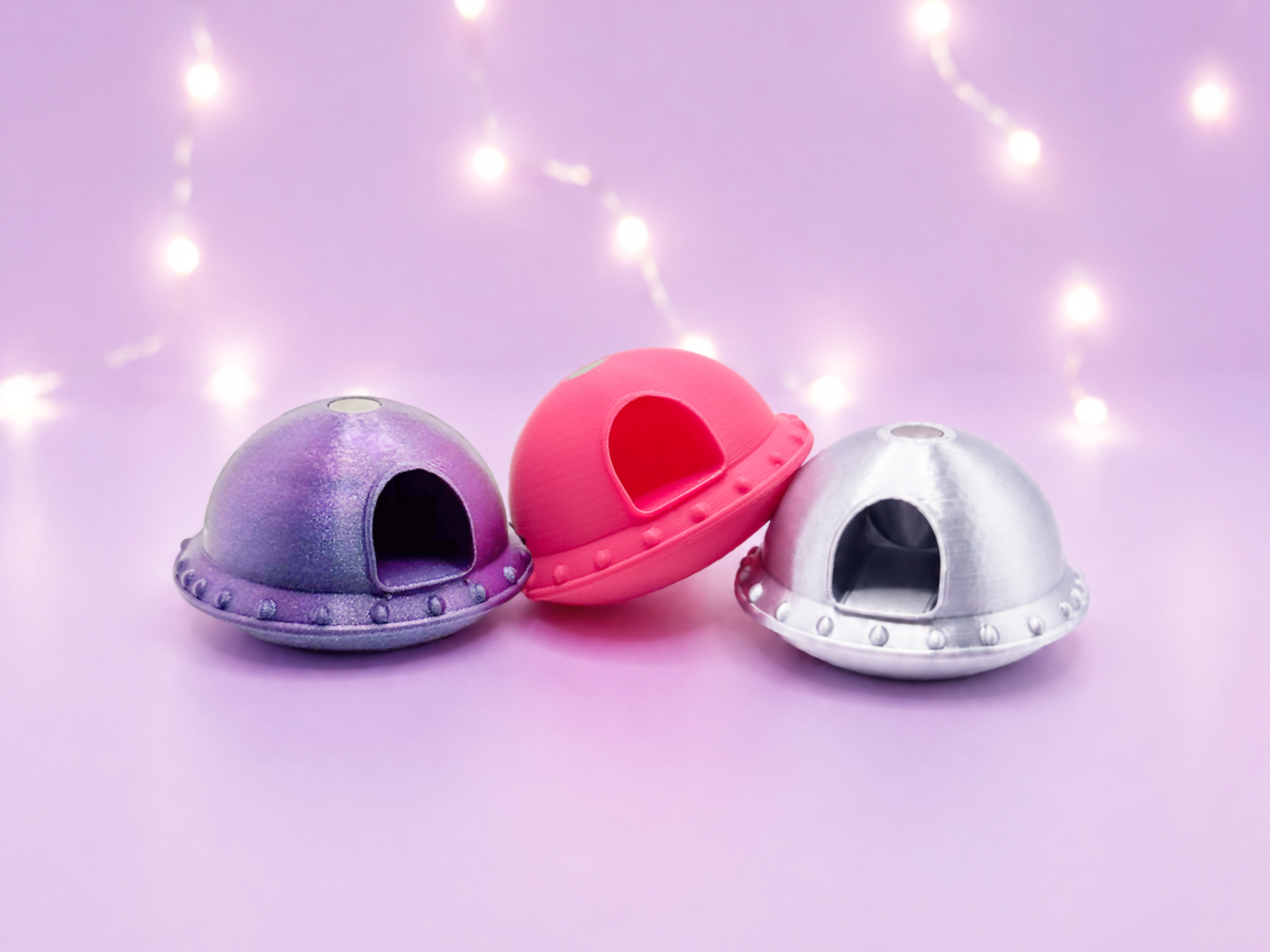 Image of 3 UFO Jumping Spider Hides in the colors purple, hot pink, and silver, by Spood Society.